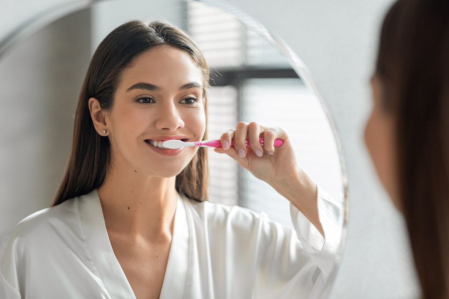 How often should I brush and floss?